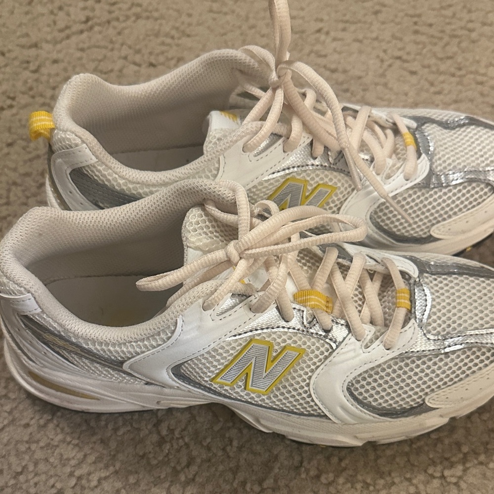 New Balance 530 White and Silver Sneakers with Yellow Accents